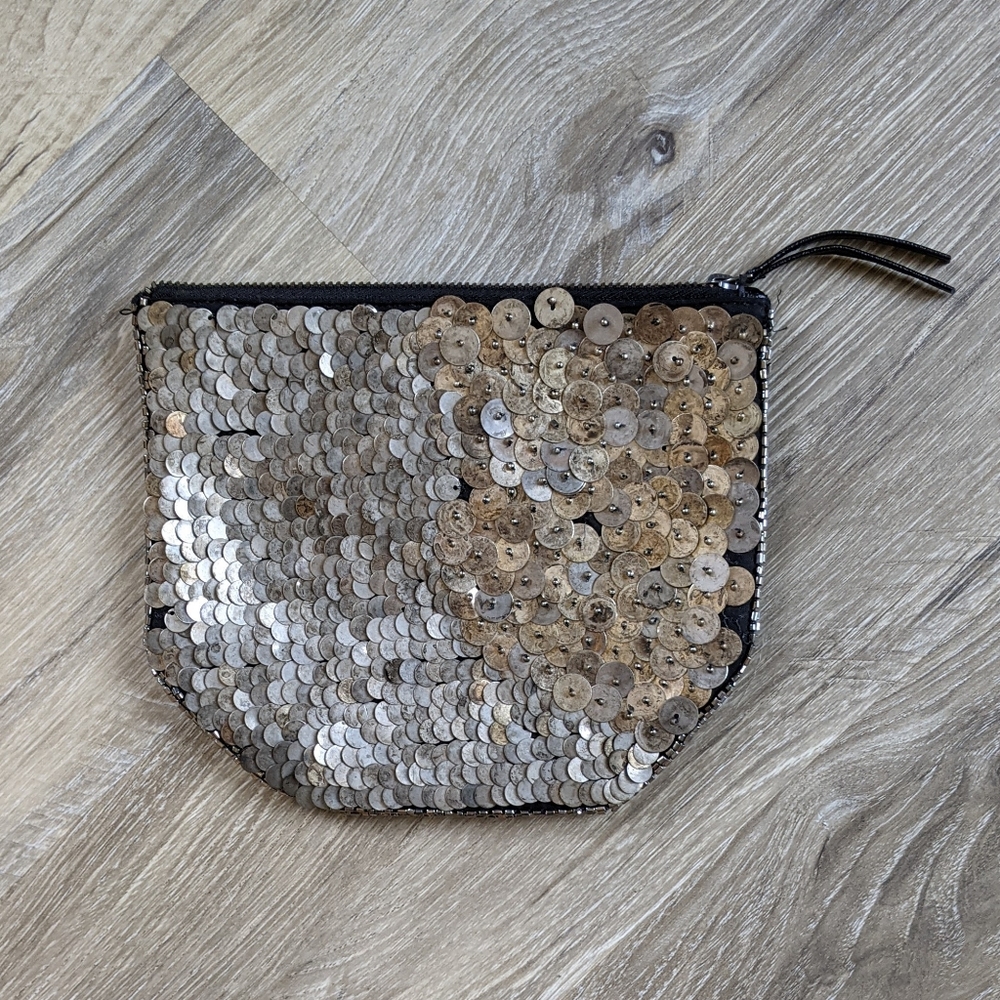Metallic sequinned clutch from Urban Outfitter